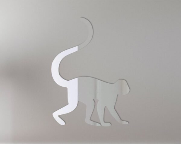 Monkey-shaped mirror with 'Monkey 2' text sign.