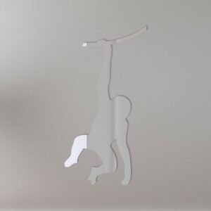 Monkey-shaped mirror with reflective surface and hanging fixture.