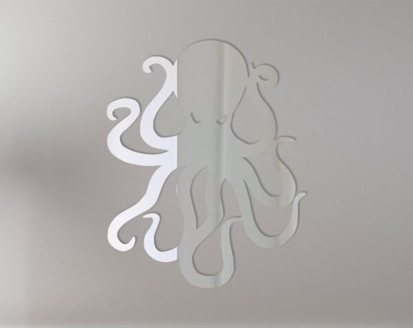 Mirror shaped like an octopus with two reflective surfaces.