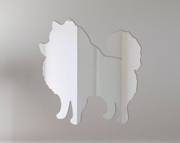 Pomeranian silhouette with reflective mirror finish on wall sign.