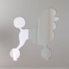 Reflective sign featuring two poodles facing each other.