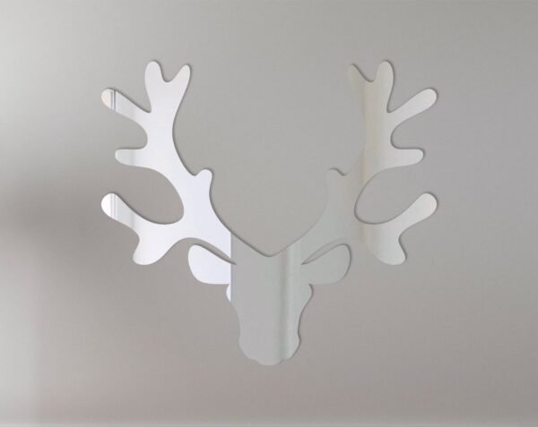 Mirror shaped like a reindeer head with reflective surface.