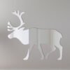 Reindeer-shaped mirror with festive details and text.