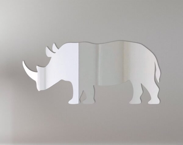 Reflective rhinoceros-shaped mirror sign on white background.