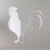 Decorative rooster-shaped mirror with intricate border design.