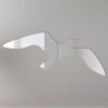 Wall-mounted mirror with seagull-shaped frame in reflective silver.