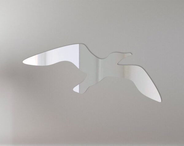 Wall-mounted mirror with seagull-shaped frame in reflective silver.