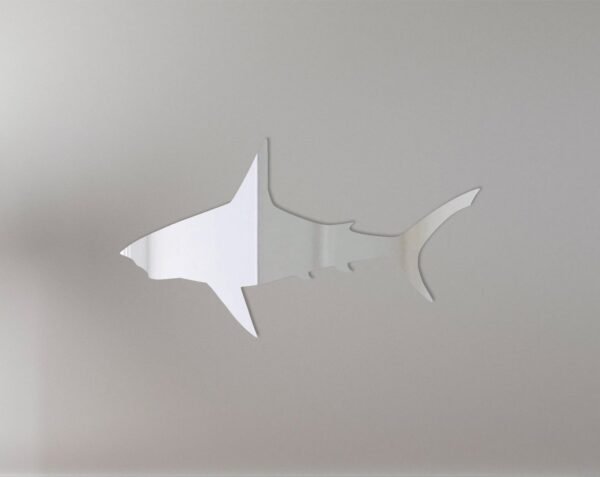 Reflective shark-shaped mirror with 'Beware' sign.