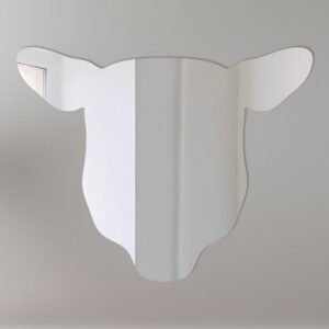 Sheep head-shaped mirror with reflective surface and hanging fixture.