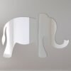 Reflective sign with an elephant design and the word 'Simple'.