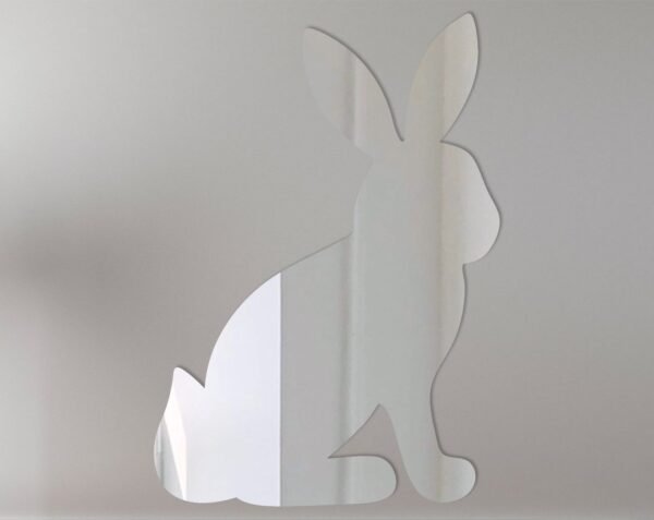 Decorative mirror sign featuring a sitting bunny design.