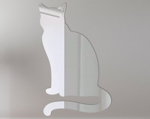 Reflective mirror sign shaped like a sitting cat.