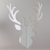 Decorative mirror shaped like a stag's head with antlers.