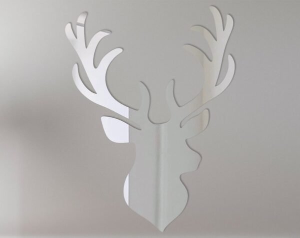 Decorative mirror shaped like a stag's head with antlers.