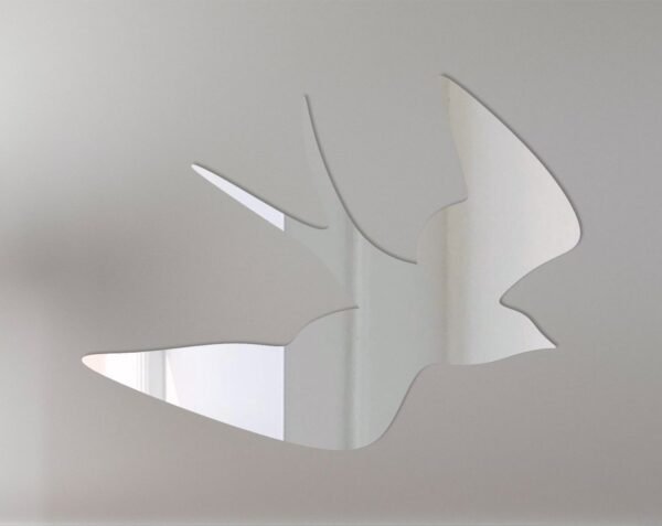 Swallow-shaped mirror with decorative frame and hanging fixture.