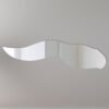 Reflective tadpole-shaped sign with bold lettering and border.