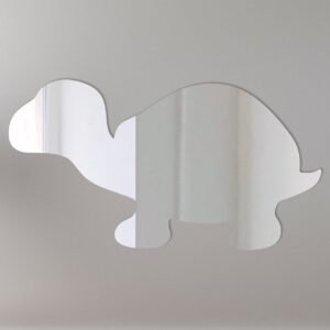 Reflective turtle-shaped sign with mirror finish and mounting holes.