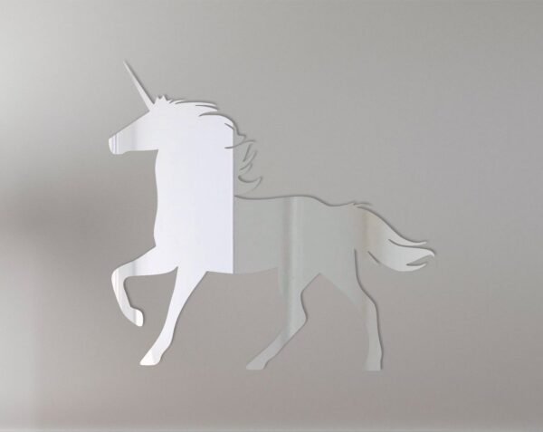 Decorative mirror sign shaped like two unicorns facing each other.