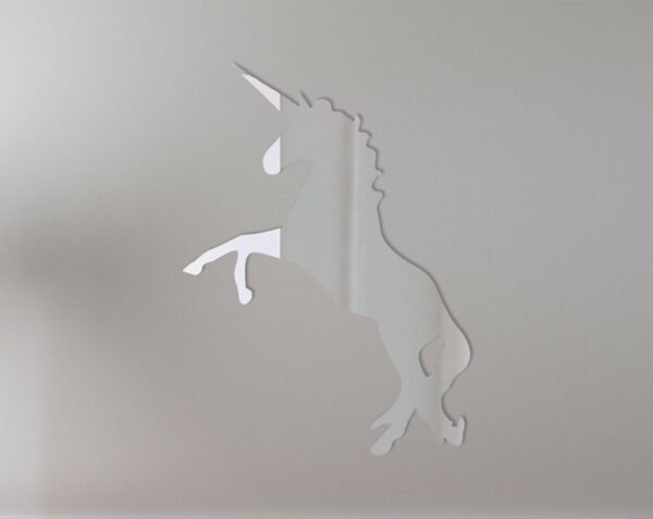 Colorful unicorn-shaped mirror with the number 4 design.