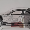 BMW 135i (E82) Blueprint Mirror featuring detailed car blueprint design.