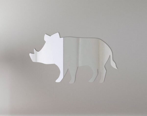 Decorative warthog-shaped mirror with 'Welcome' sign.