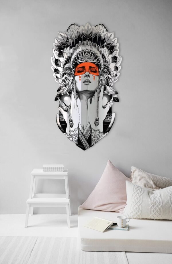 Mirror with tattoo artist reflecting woman in Native American war bonnet.