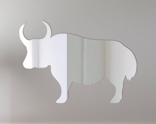 Decorative mirror with yak silhouette and rustic frame.