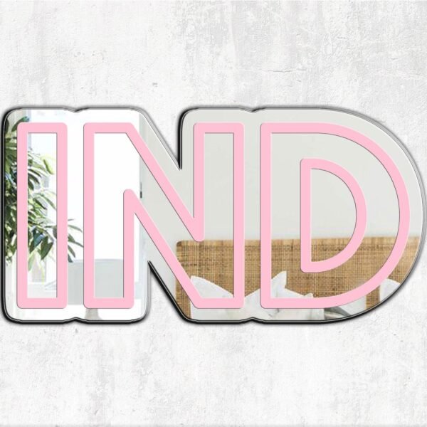 "Rose pink irregular mirror with 'IND Indianapolis Airport' design"