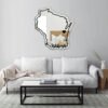 "Irregular mirror with cursive 'University of Wisconsin Oshkosh' state design"