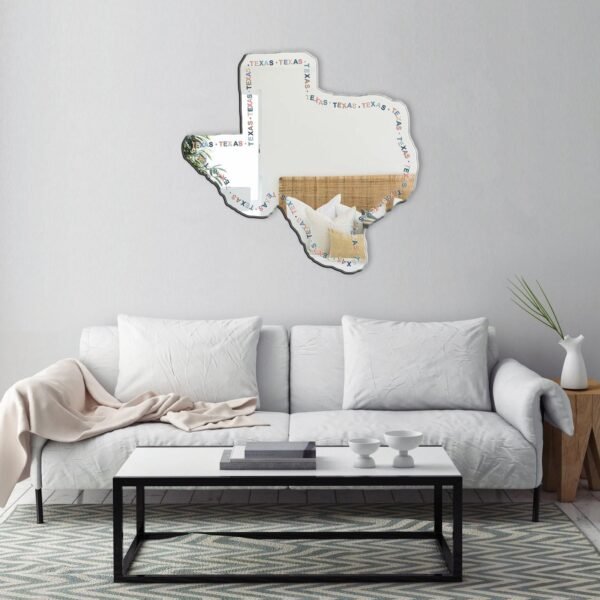"Irregular-shaped mirror in the outline of Texas"