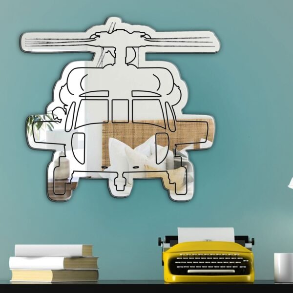 "Mirror featuring a black graphic of a Black Hawk helicopter"
