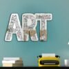 "Mirror featuring an artistic design with inscriptions of various art tools"