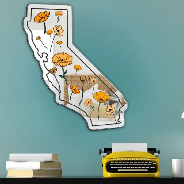 "Mirror featuring California state outline with poppies design"