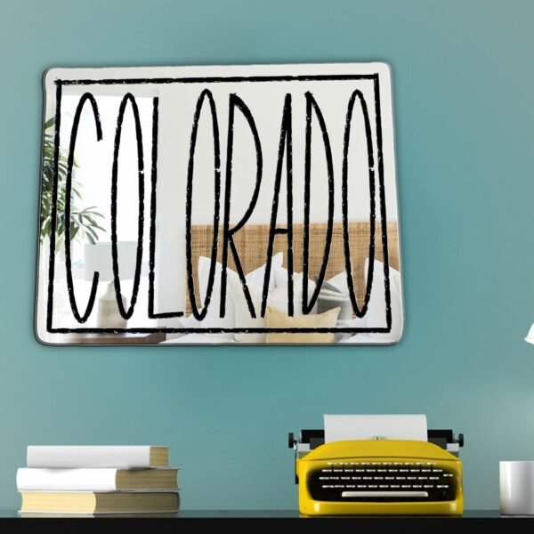 "Mirror shaped like the outline of Colorado with decorative elements"