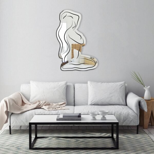 Mirror featuring a line art drawing of a woman titled 'Visions of Vera