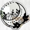 Mirror featuring a design inspired by the moon