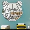 Wall-mounted mirror featuring a black and white geometric bear design