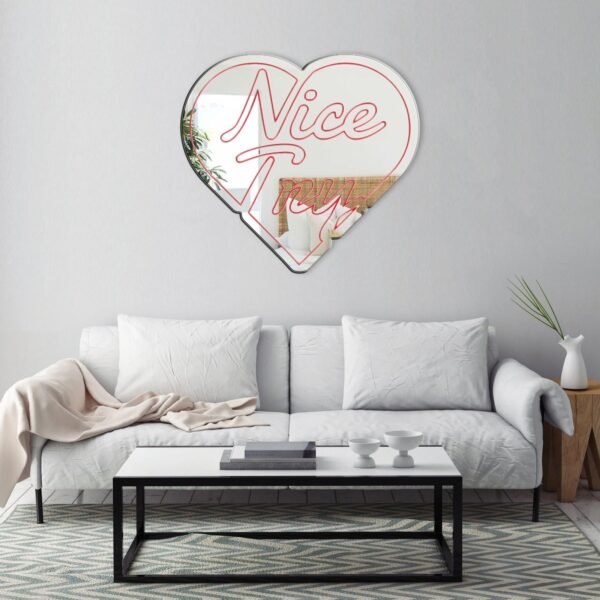 Mirror featuring the phrase 'NICE TRY' in bold text with a heart design