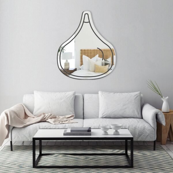 Mirror featuring a black flat design of a fig icon in contemporary style