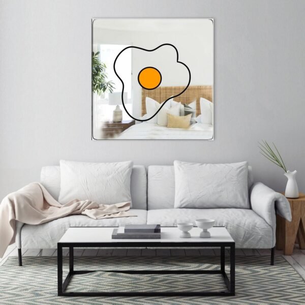 Mirror featuring an illustration of a fried egg with yolk and white