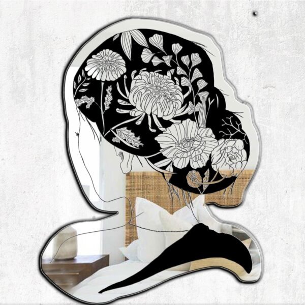 Mirror featuring a design of a girl surrounded by floral elements