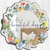 Mirror featuring the quote 'It's a Beautiful Day to Save Lives' surrounded by wildflower floral design