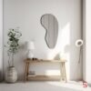 Asymmetrical mirror with an irregular shape, designed for living room decor