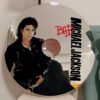 Shop our unique CD mirror inspired by Michael Jackson's iconic 'BAD' album. Perfect for fans and collectors, this decorative mirror combines functionality with a tribute to one of music's greatest legends. Available in various sizes, it's a must-have for any MJ enthusiast.