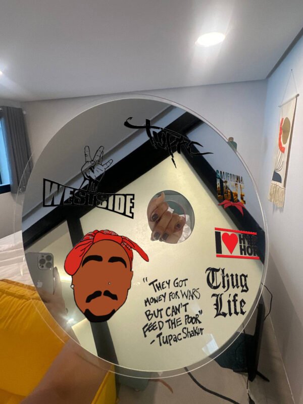 Tupac-themed CD wall mirror with iconic quotes and designs like 'Thug Life