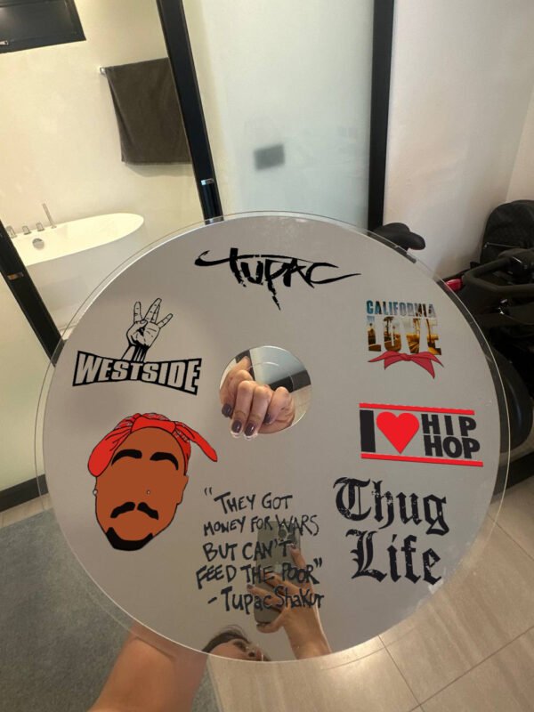 Tupac Shakur-inspired CD mirror with 'Thug Life,' 'Westside,' and 'California Love' designs in a stylish interior