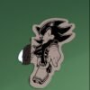 Front view of Shadow the Hedgehog adhesive wall mirror mounted on a green wall.