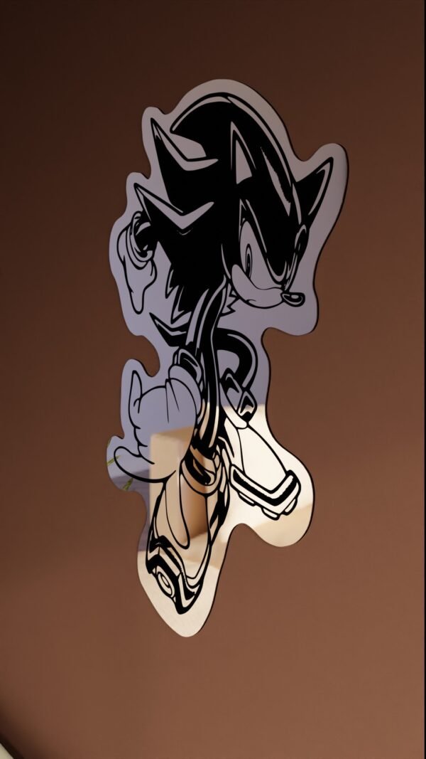 silhouette and reflective acrylic surface showing Shadow in mid-dash